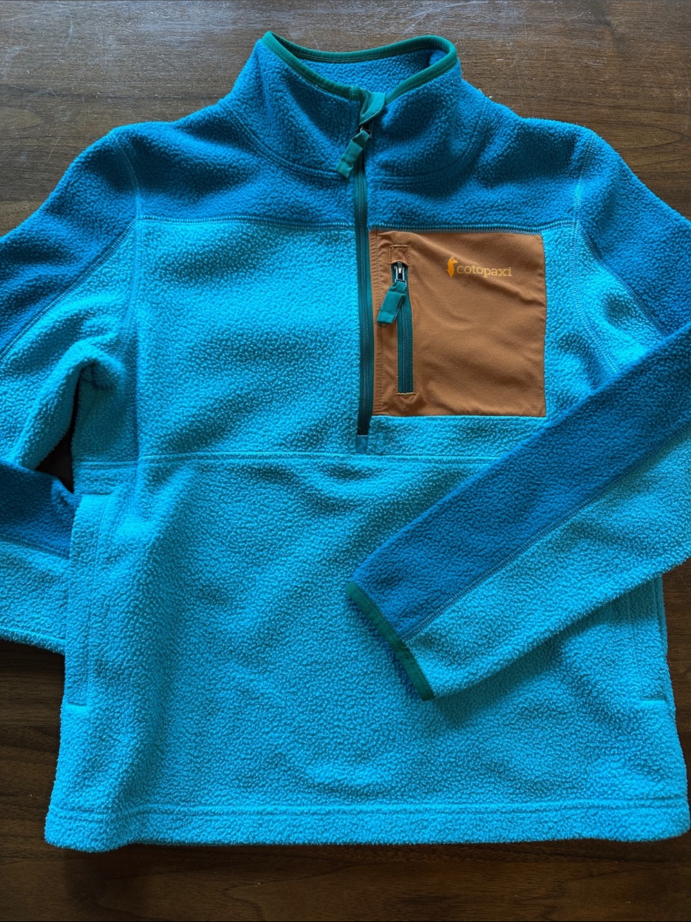 cotopaxi Teal Blue Fleece Pullover with Brown Chest Pocket